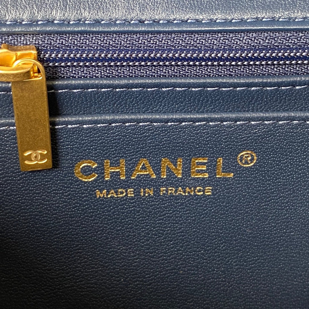 Chanel AS2431 mini flap bag with top handle lambskin leather navy blue
