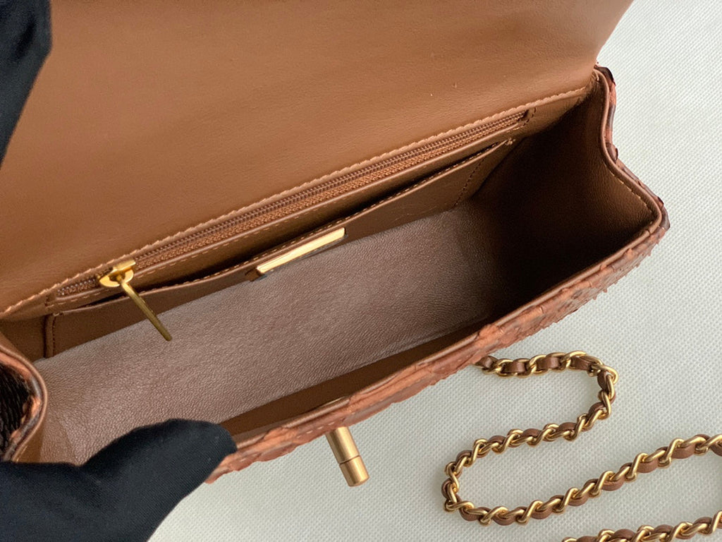 Chanel AS2431 mini flap bag with top handle snake leather brown