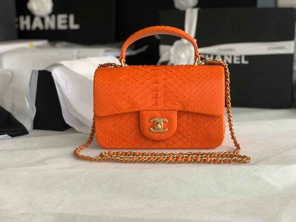 Chanel AS2431 mini flap bag with top handle snake leather orange