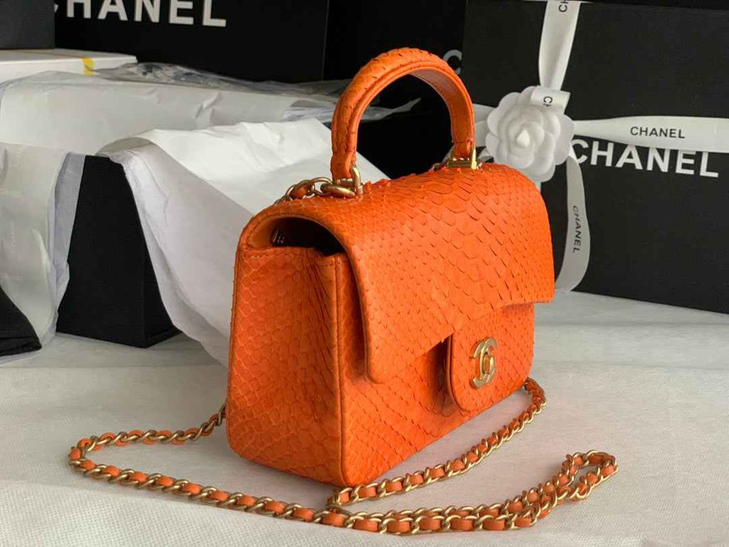 Chanel AS2431 mini flap bag with top handle snake leather orange