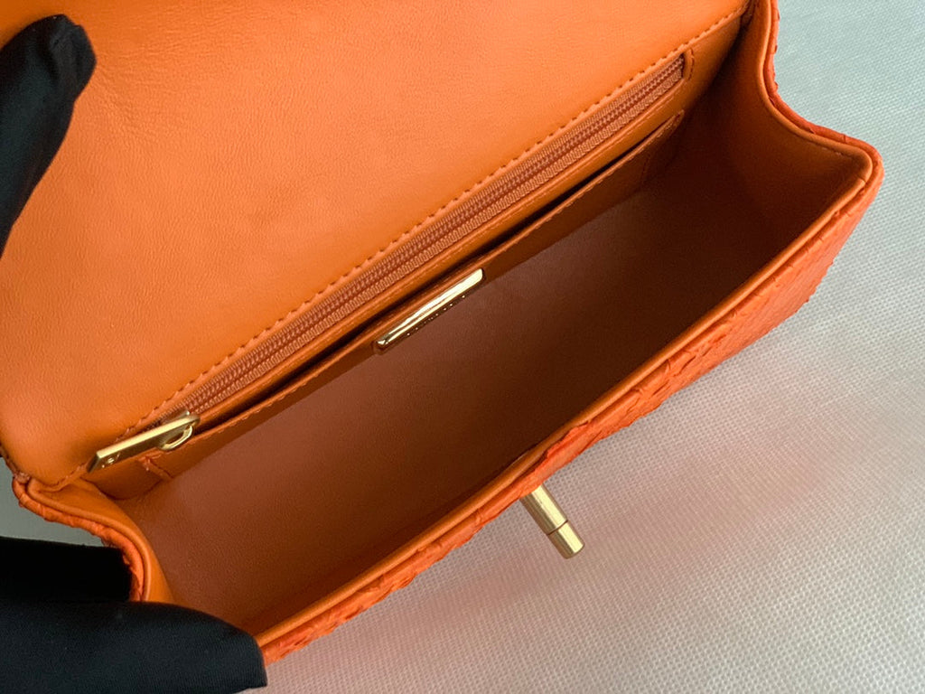 Chanel AS2431 mini flap bag with top handle snake leather orange