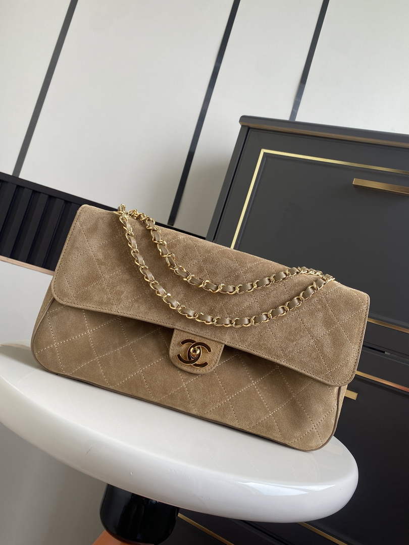 Chanel AS6281 dark beige suede calfskin Maxi flap bag with gold-tone hardware.