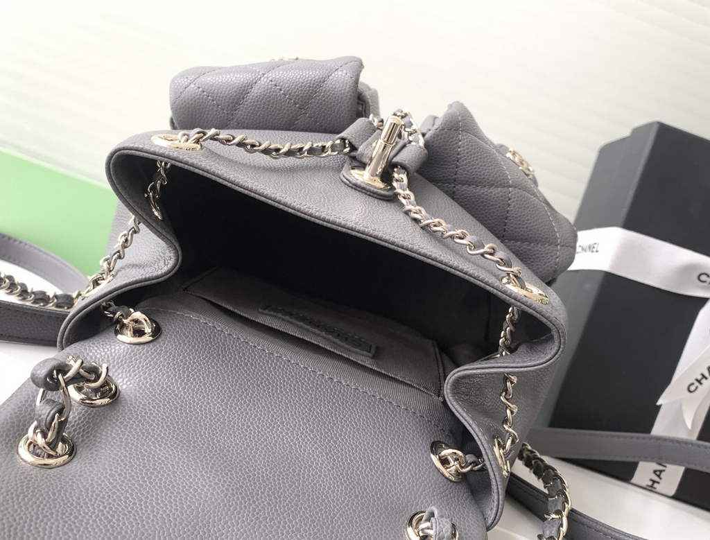 Chanel backpack Grained shiny calfskin AS3860 gold gray
