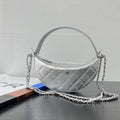 Back side of Chanel AP5094 chain clutch bag, showing stitched diamond quilting and rear pocket