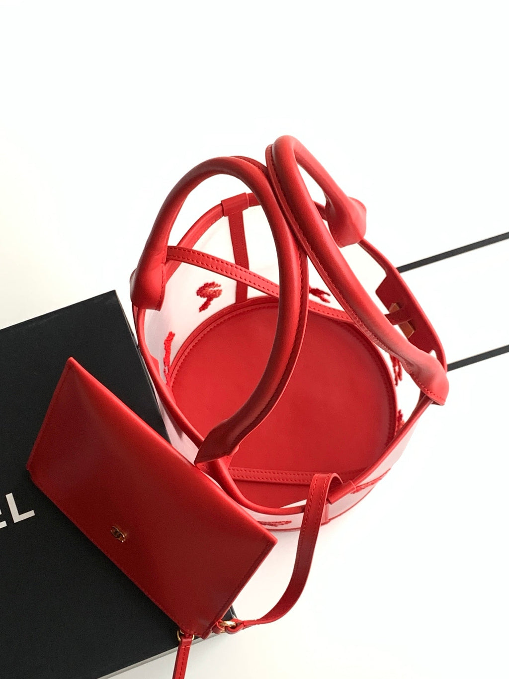 Chanel Large Bucket Bag in black mesh and calfskin leather, model AS6195, featuring a drawstring closure and signature interwoven chain strap.