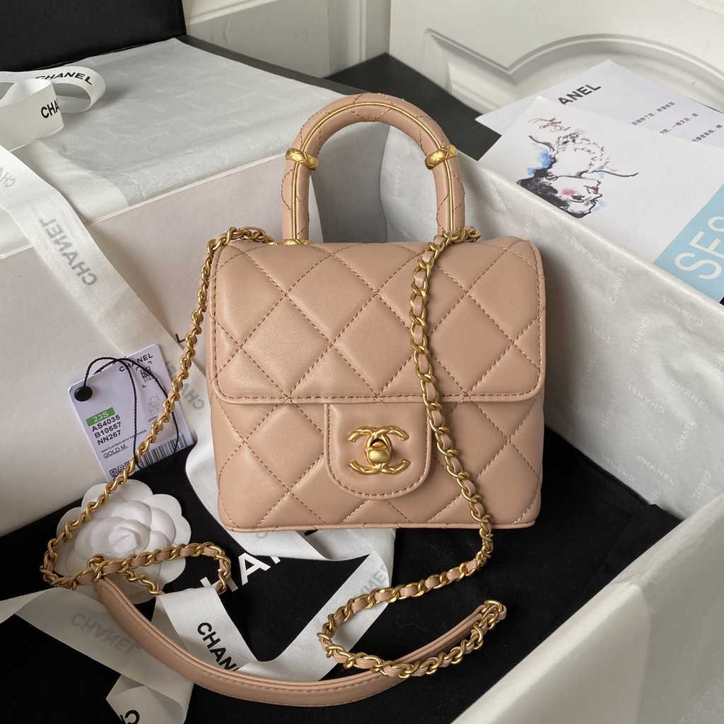 Chanel Mini flap bag with top handle light pink Lambskin Gold-tone Metal AS4035