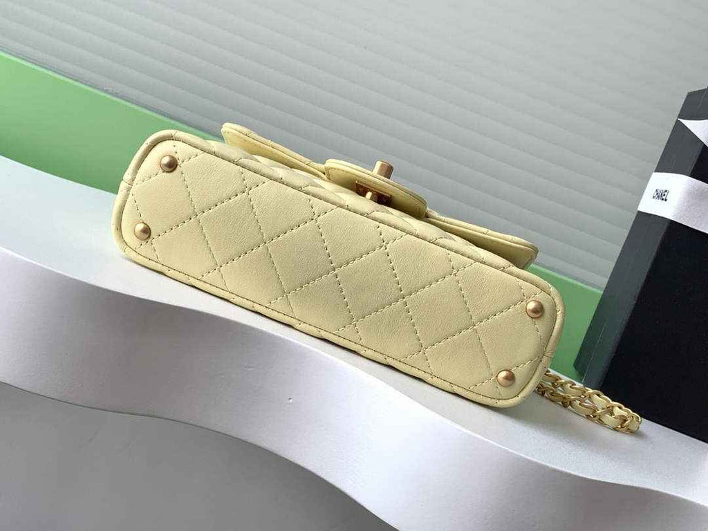 Chanel small flap bag with top handle, AS5355, Yellow lambskin