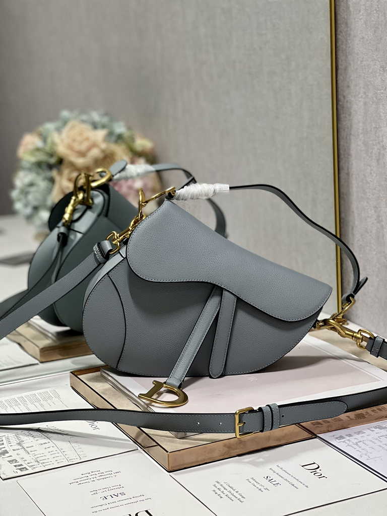 16. Dior Saddle Bag M0455 in classic black leather with silver hardware