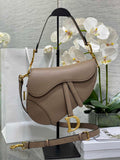 26. Dior Saddle Bag M0455 belt-inspired buckle on strap attachment
