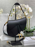 31. Dior Saddle Bag M0455 placed on a marble surface studio shot