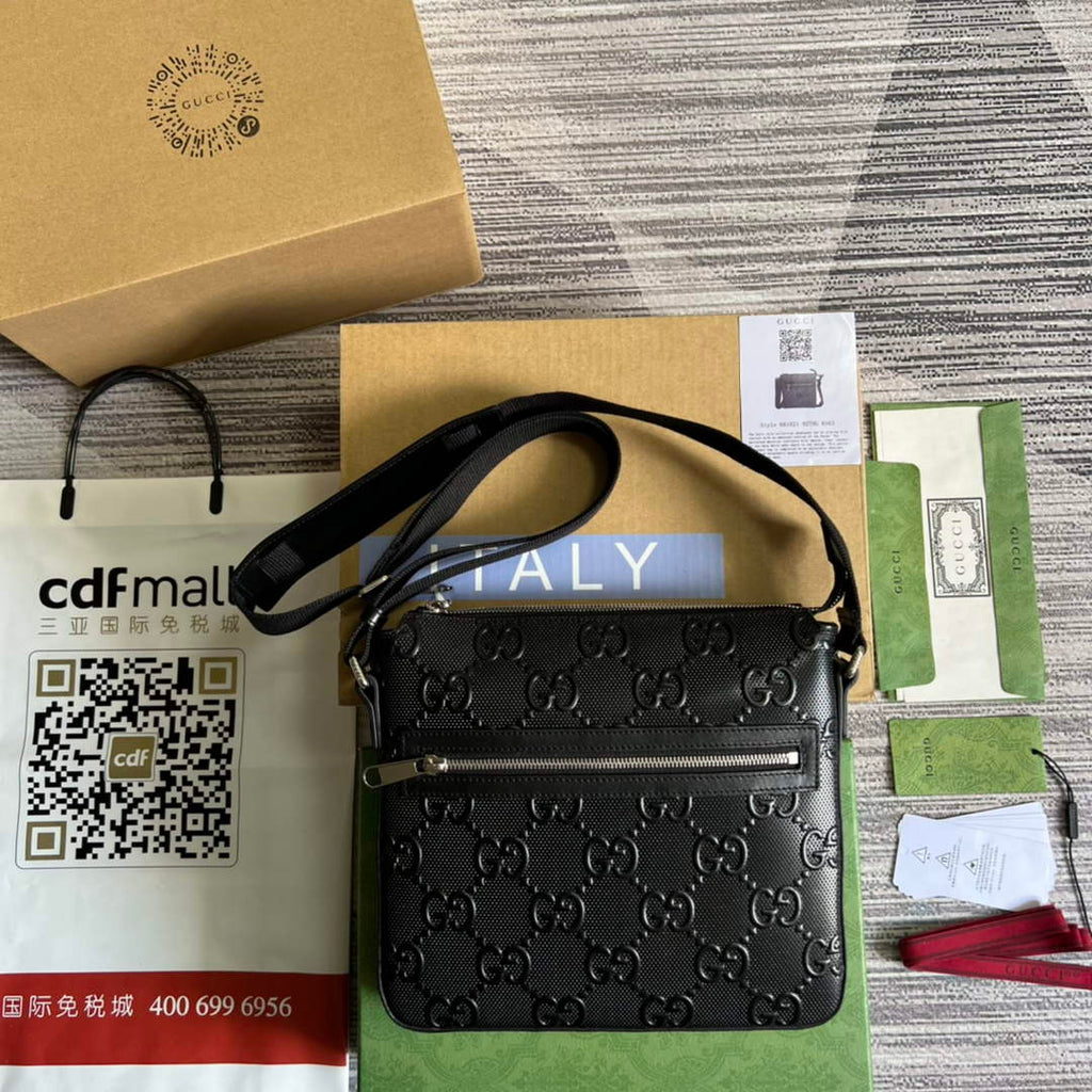 Gucci ‎406410 GG embossed messenger bag black