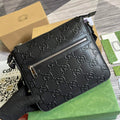 Gucci ‎406410 GG embossed messenger bag black