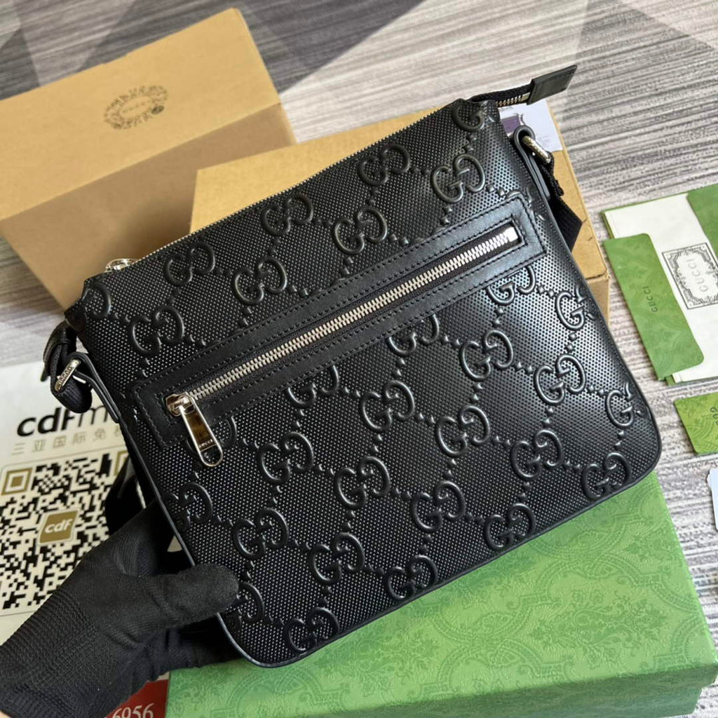 Gucci ‎406410 GG embossed messenger bag black
