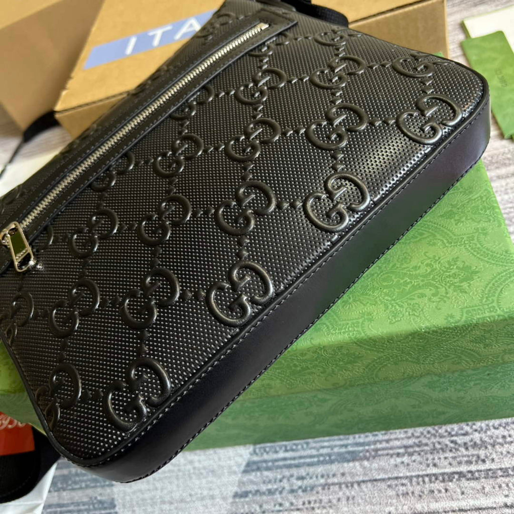 Gucci ‎406410 GG embossed messenger bag black