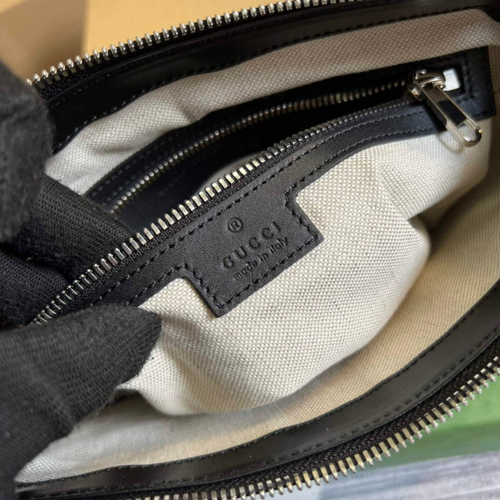 Gucci ‎406410 GG embossed messenger bag black