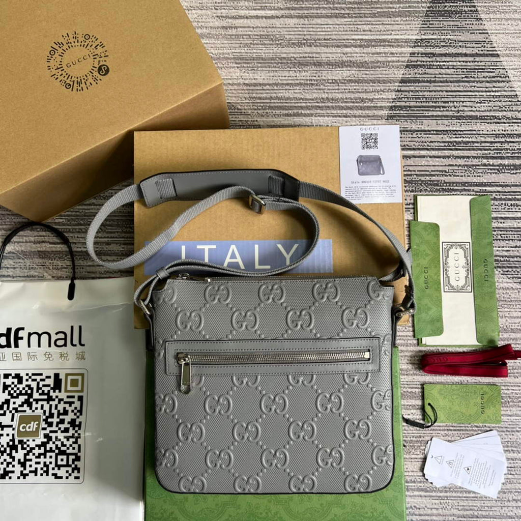 Gucci ‎406410 GG embossed messenger bag gray