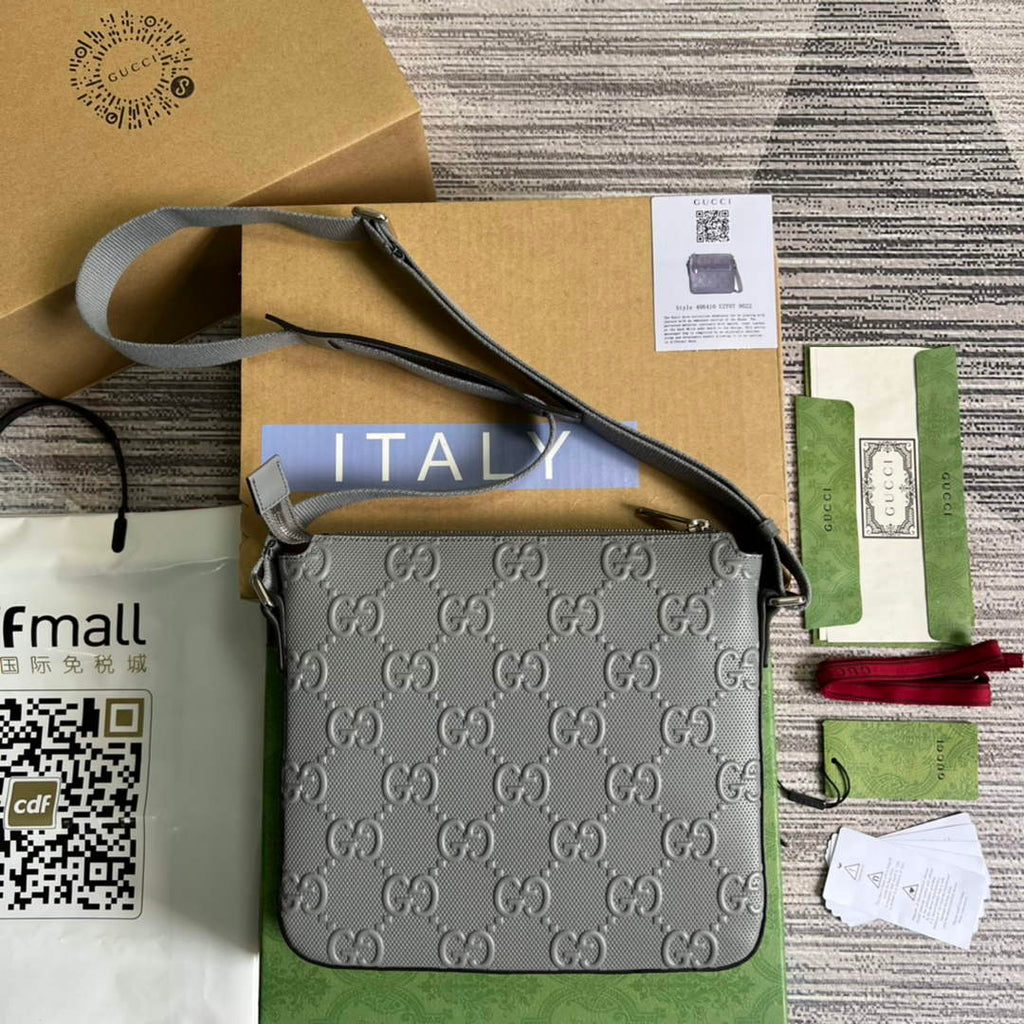 Gucci ‎406410 GG embossed messenger bag gray