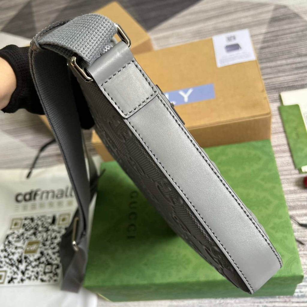 Gucci ‎406410 GG embossed messenger bag gray