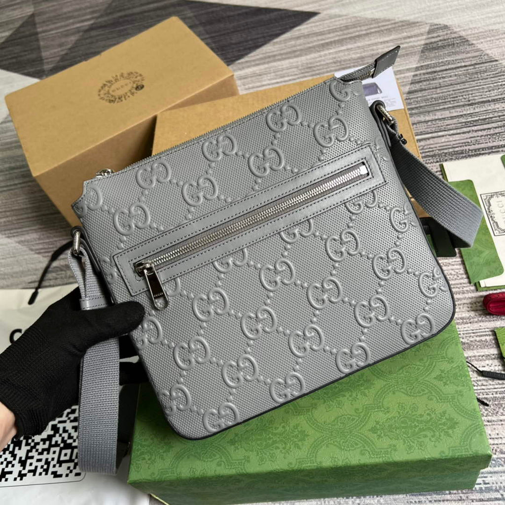 Gucci ‎406410 GG embossed messenger bag gray