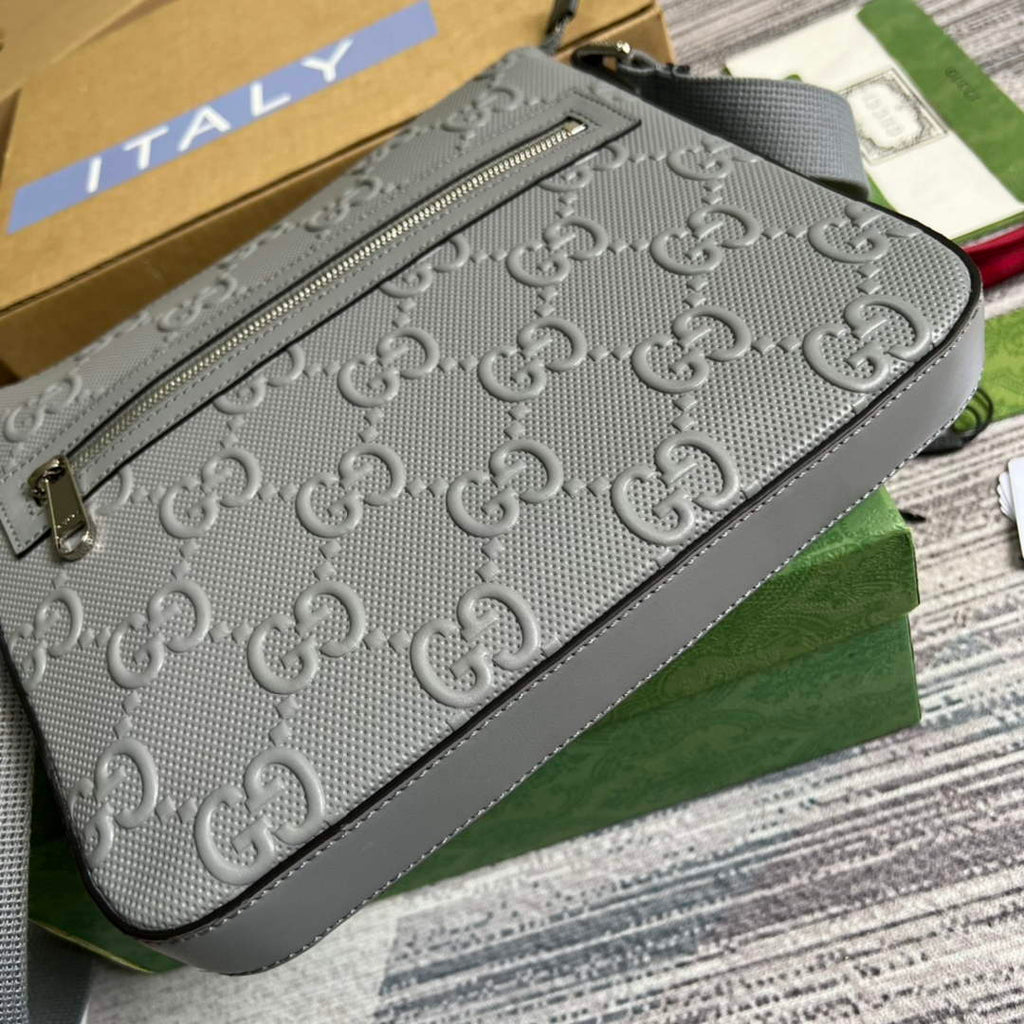 Gucci ‎406410 GG embossed messenger bag gray