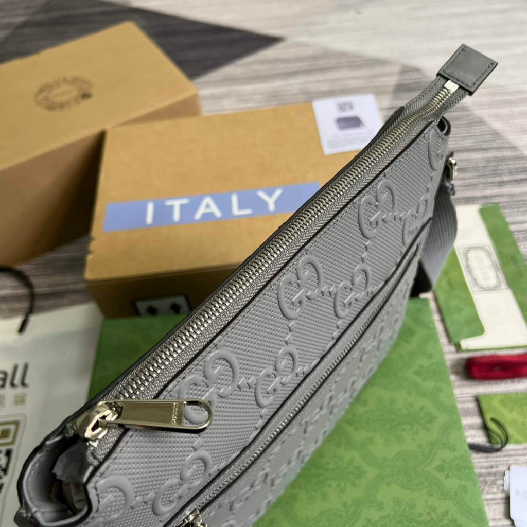 Gucci ‎406410 GG embossed messenger bag gray