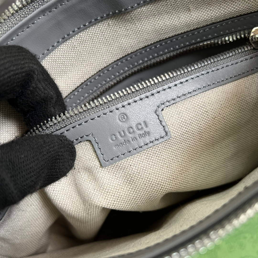 Gucci ‎406410 GG embossed messenger bag gray
