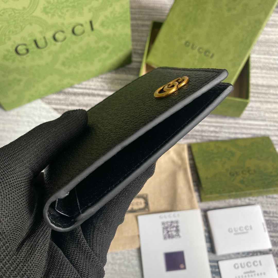 Gucci ‎428726 GG Marmont leather bi-fold wallet black gold