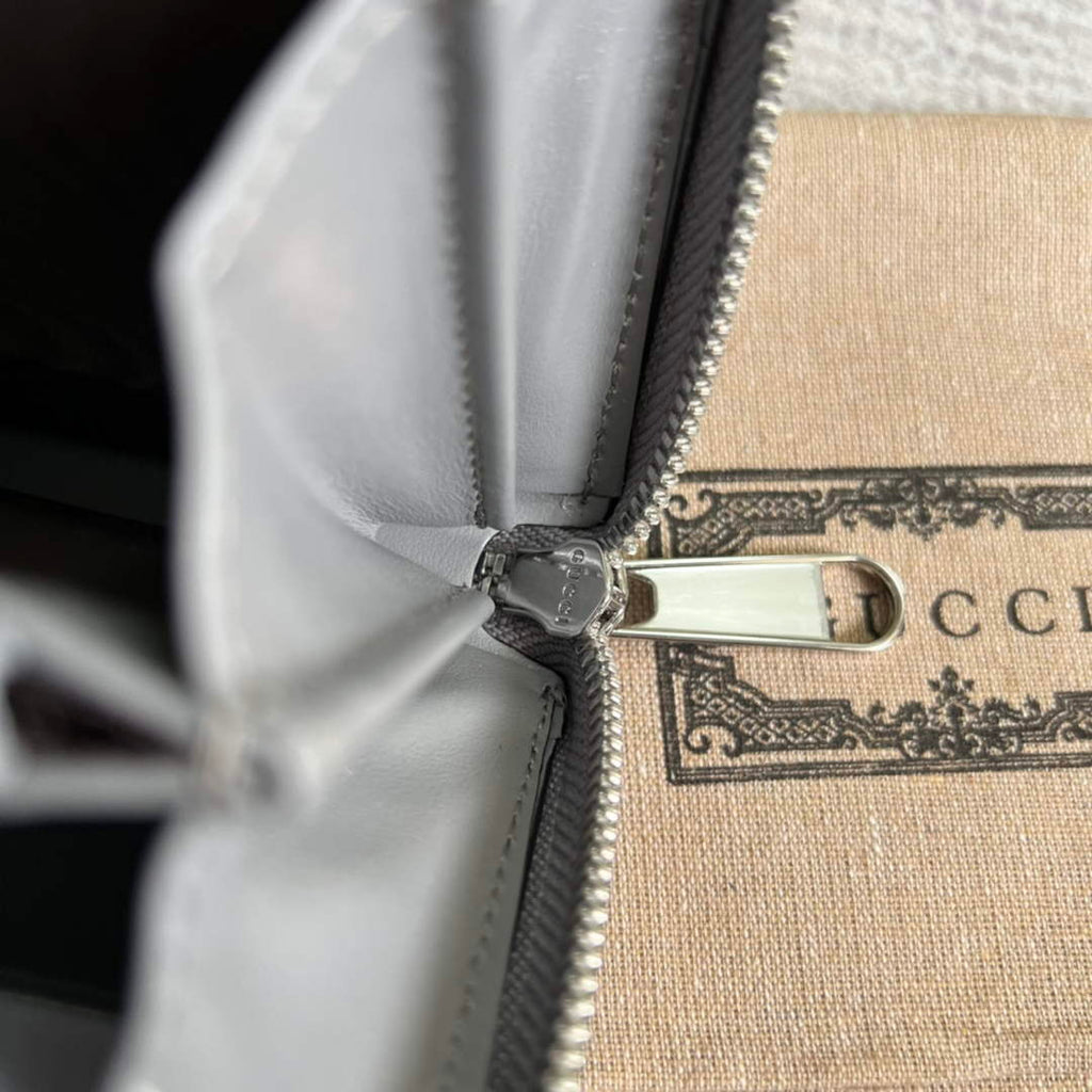 ‎Gucci ‎625558 GG embossed zip around wallet gray
