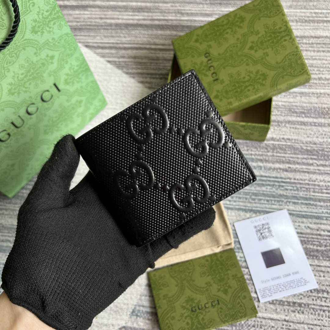 ‎Gucci ‎625559 GG embossed bi-fold wallet black