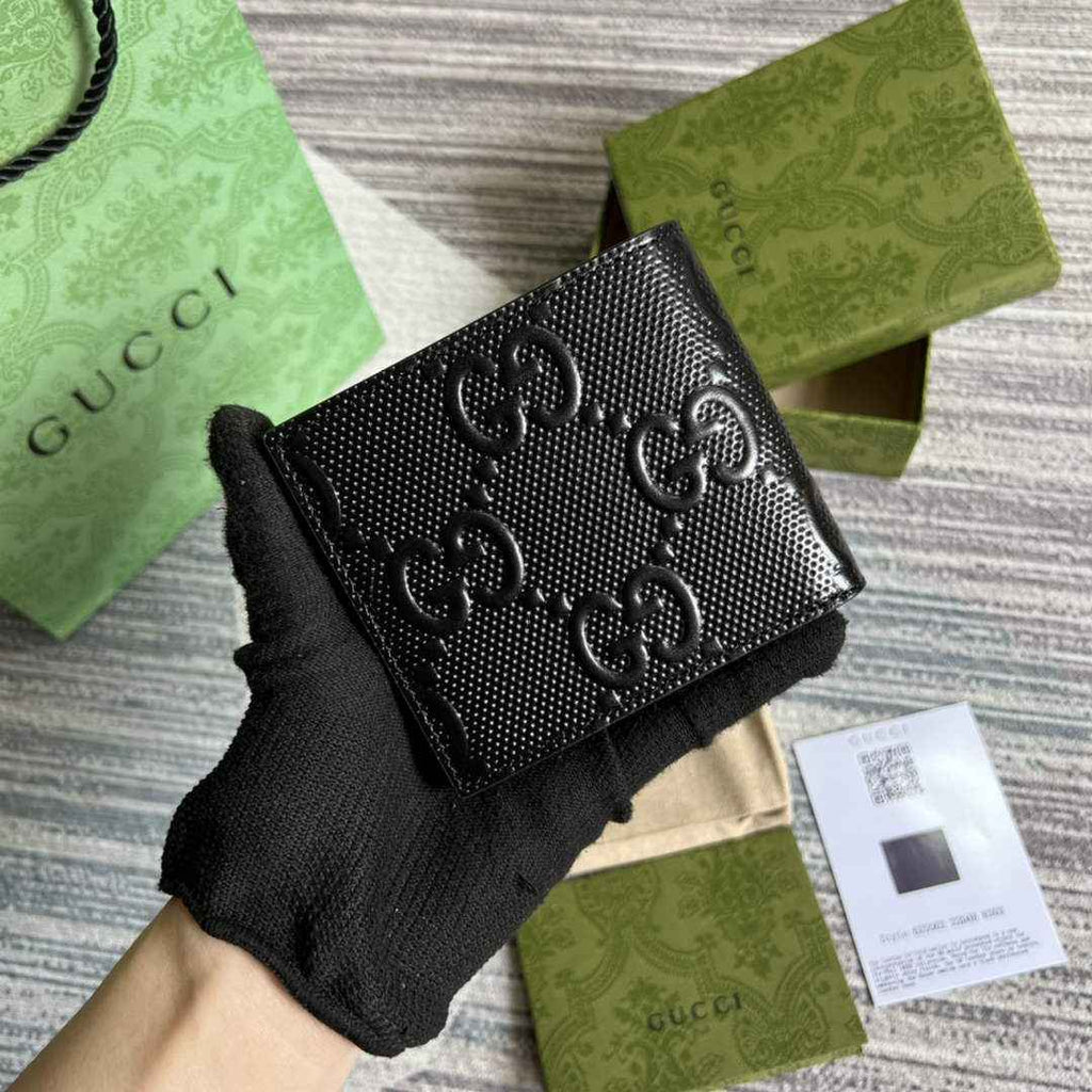 ‎Gucci ‎625559 GG embossed bi-fold wallet black