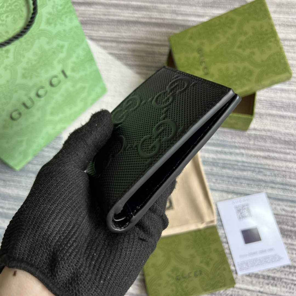 ‎Gucci ‎625559 GG embossed bi-fold wallet black