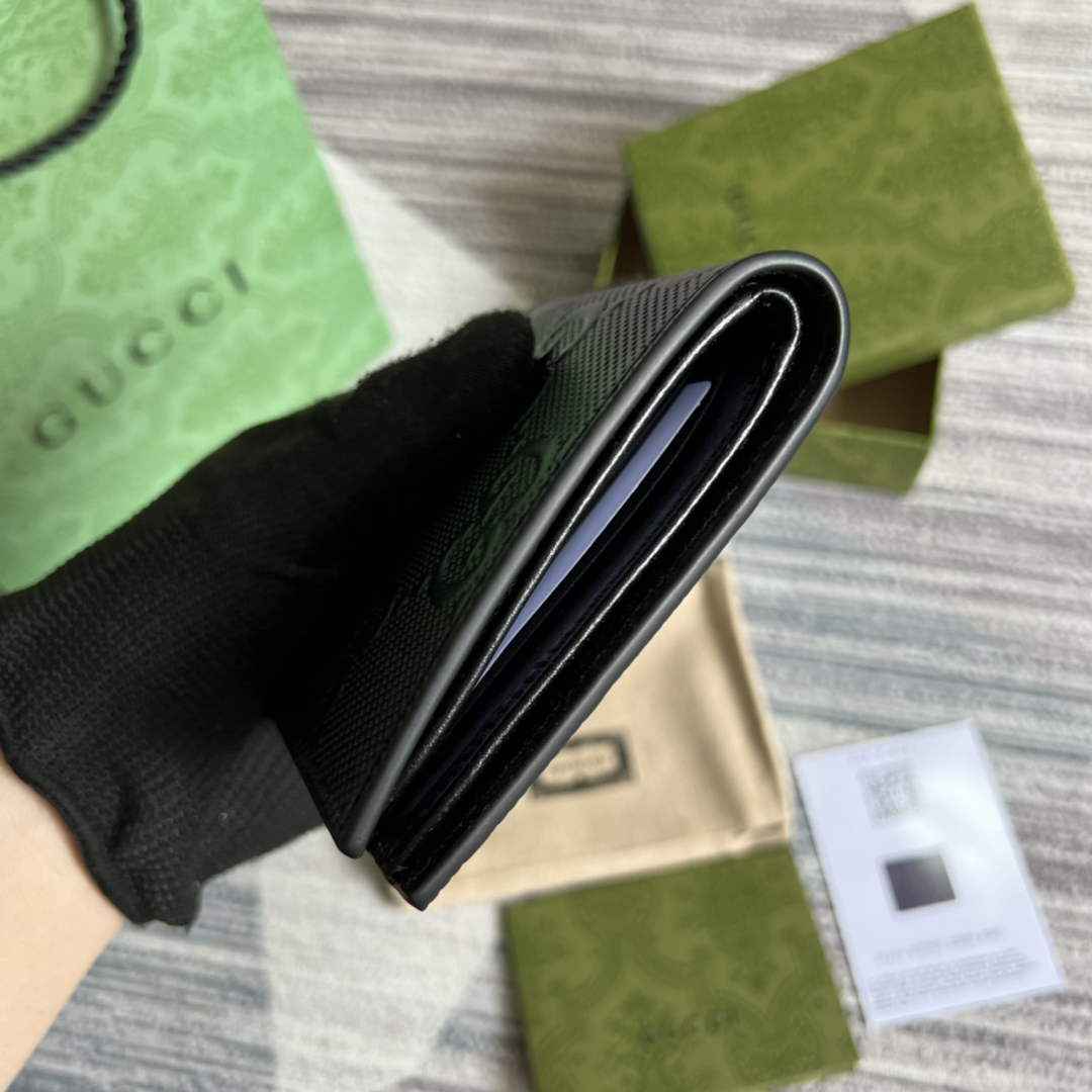 ‎Gucci ‎625559 GG embossed bi-fold wallet black