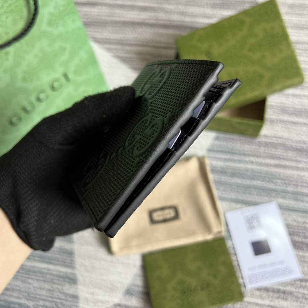 ‎Gucci ‎625559 GG embossed bi-fold wallet black