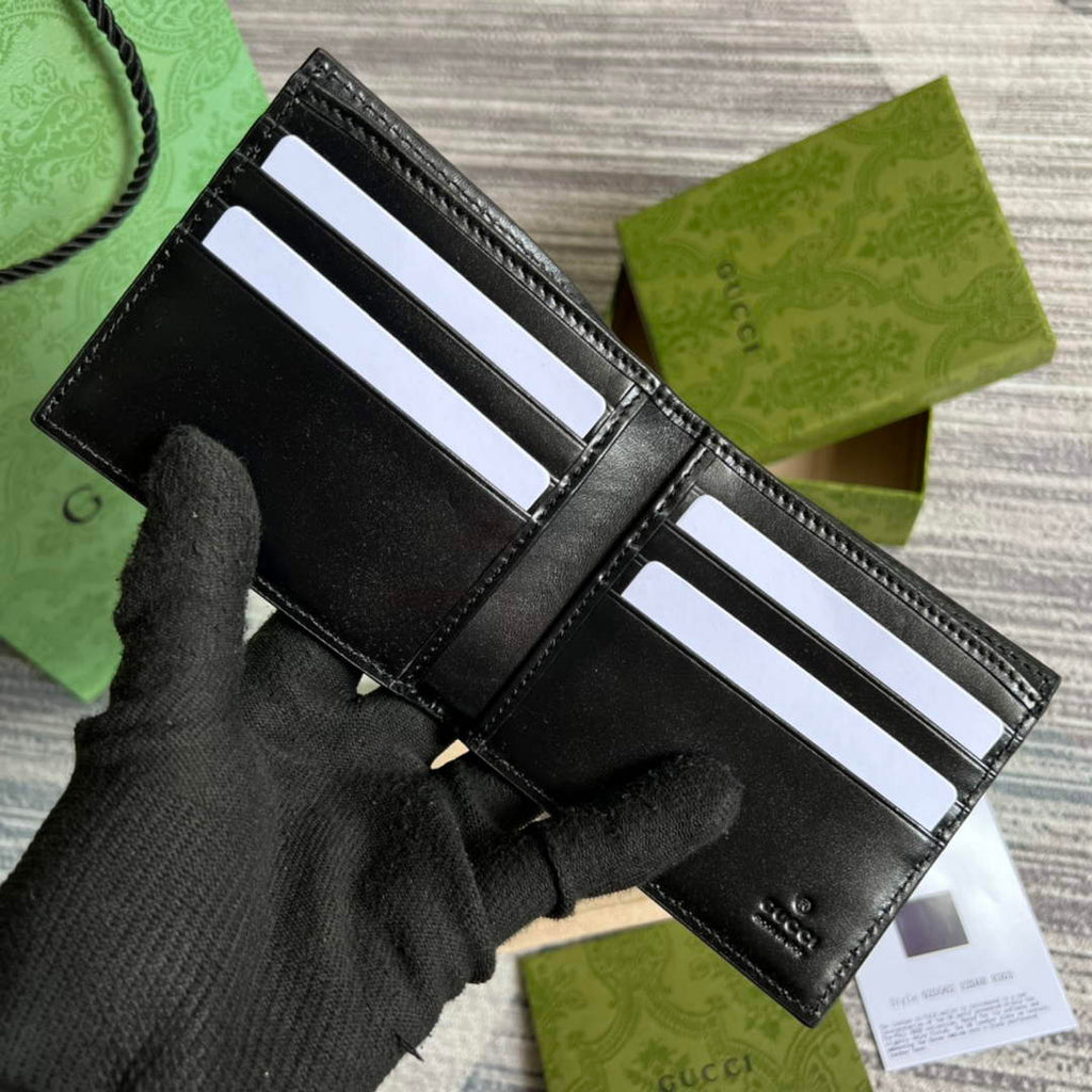 ‎Gucci ‎625559 GG embossed bi-fold wallet black