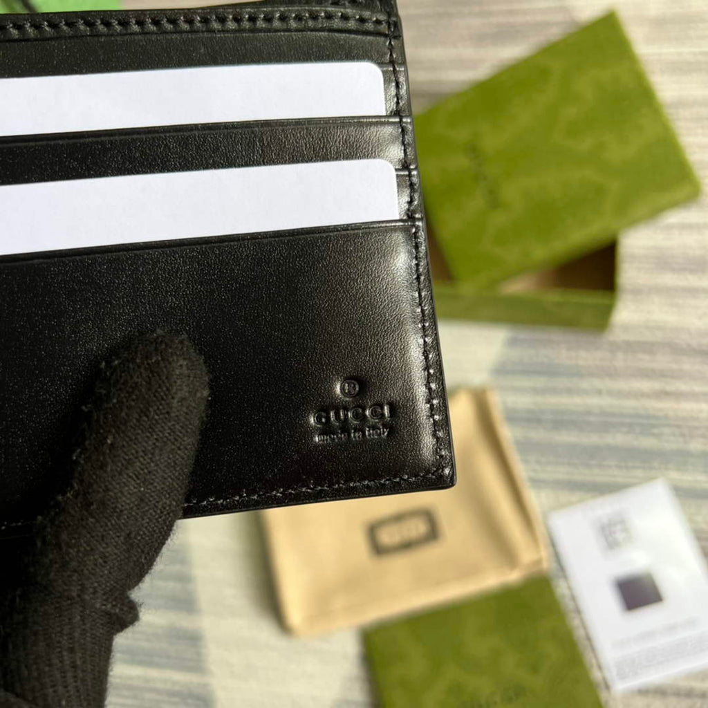 ‎Gucci ‎625559 GG embossed bi-fold wallet black