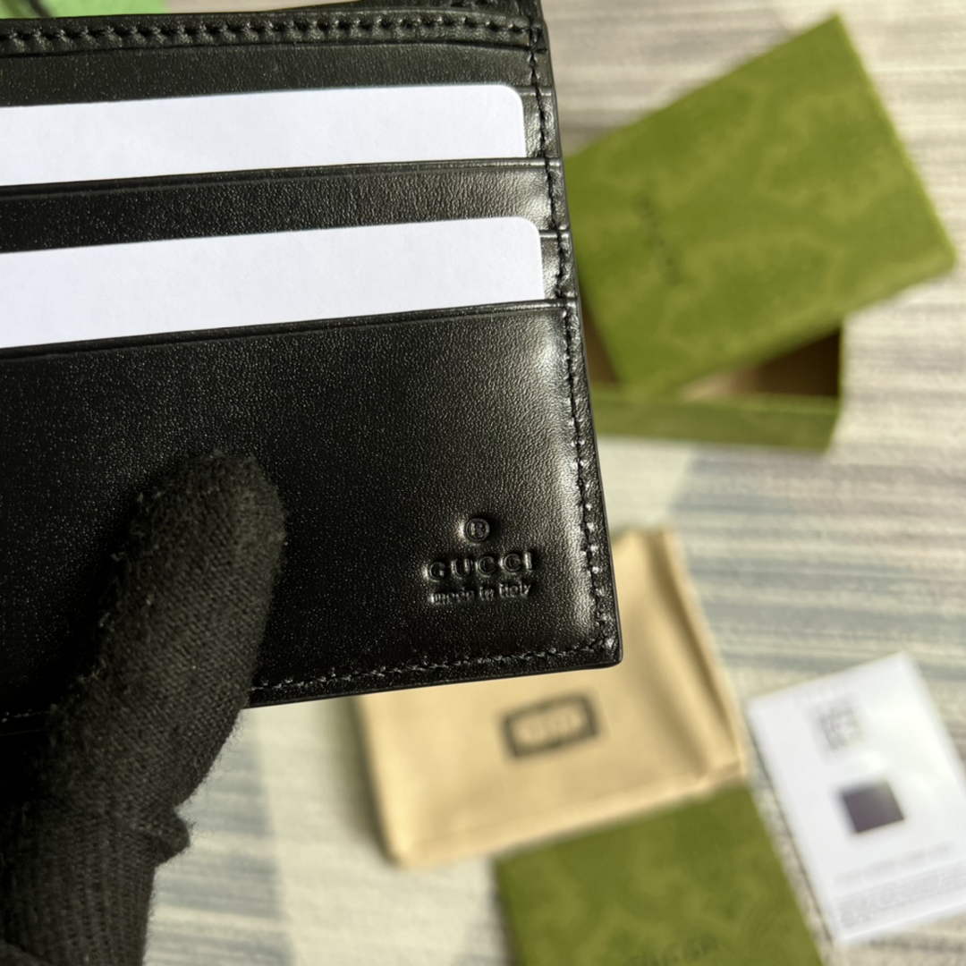 ‎Gucci ‎625559 GG embossed bi-fold wallet black