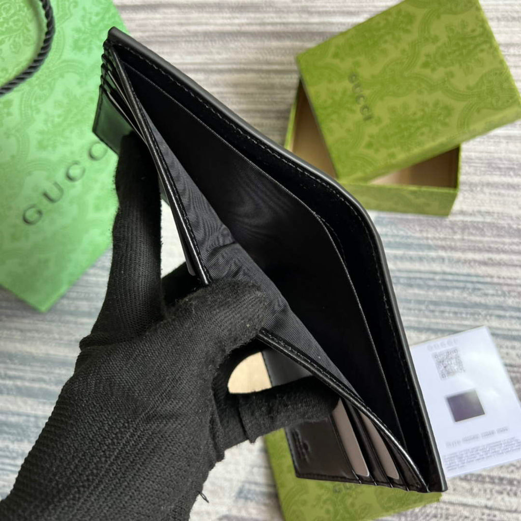 ‎Gucci ‎625559 GG embossed bi-fold wallet black