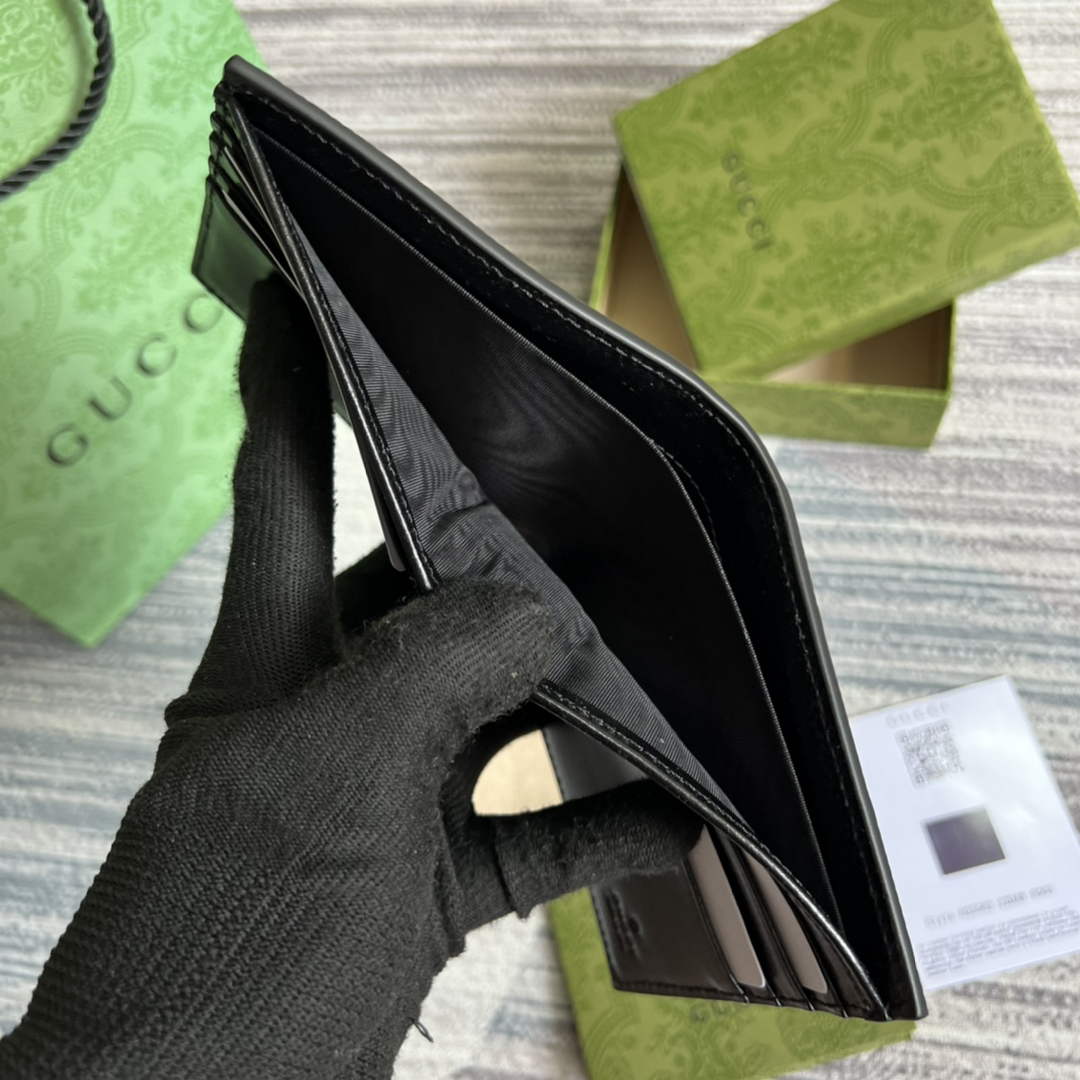 ‎Gucci ‎625559 GG embossed bi-fold wallet black