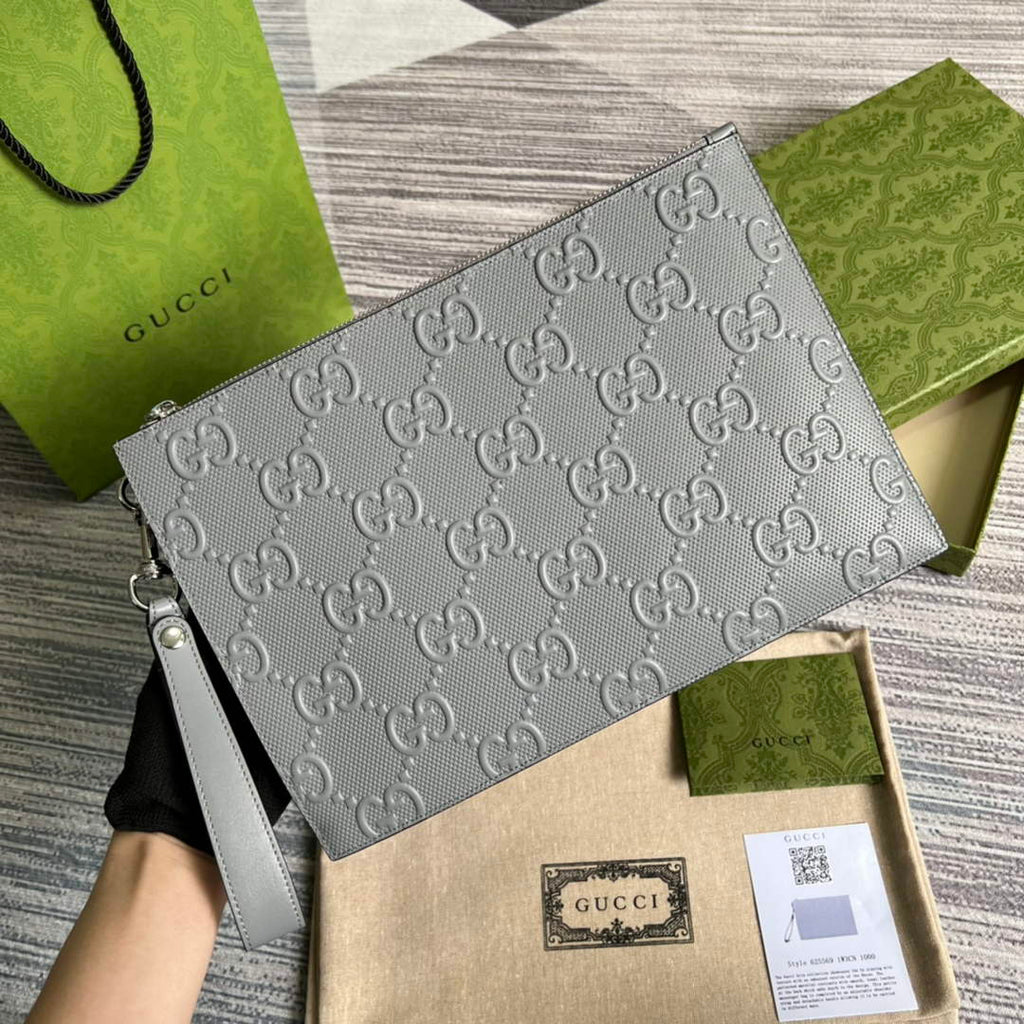 Gucci ‎‎625569 GG embossed pouch gray
