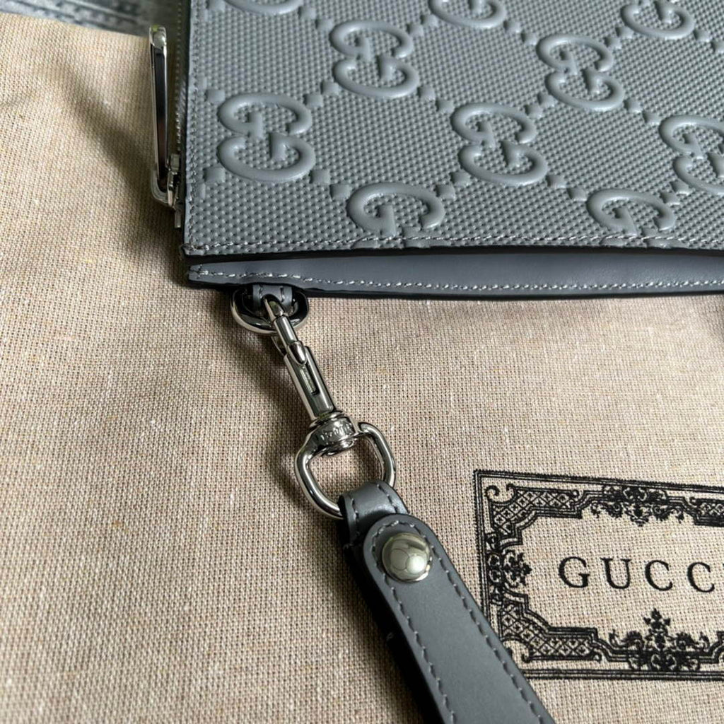 Gucci ‎‎625569 GG embossed pouch gray