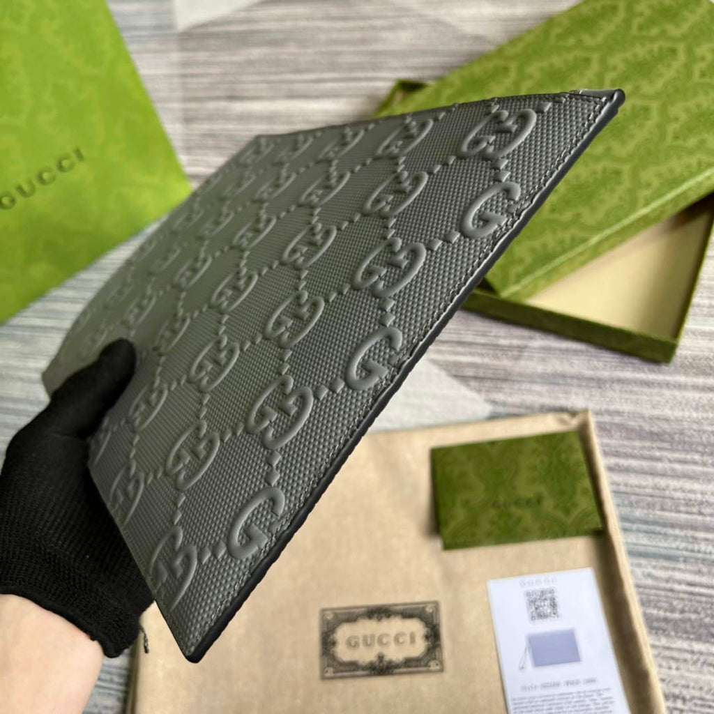 Gucci ‎‎625569 GG embossed pouch gray
