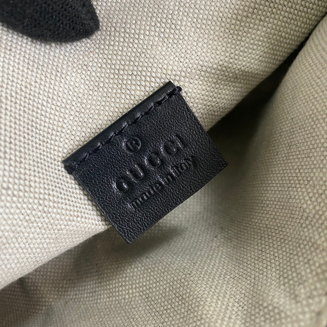 Gucci 658582 GG embossed belt bag Black GG embossed leather