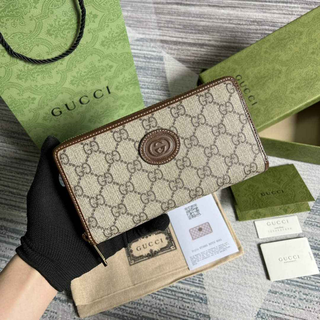 ‎Gucci 673003 Zip around wallet with Interlocking G brown