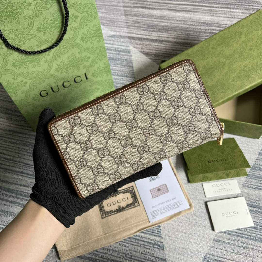 ‎Gucci 673003 Zip around wallet with Interlocking G brown