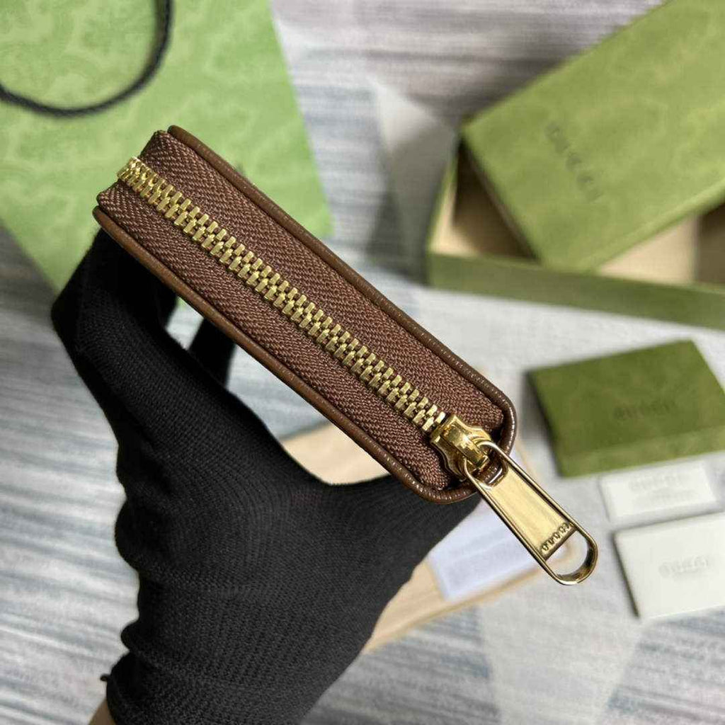 ‎Gucci 673003 Zip around wallet with Interlocking G brown