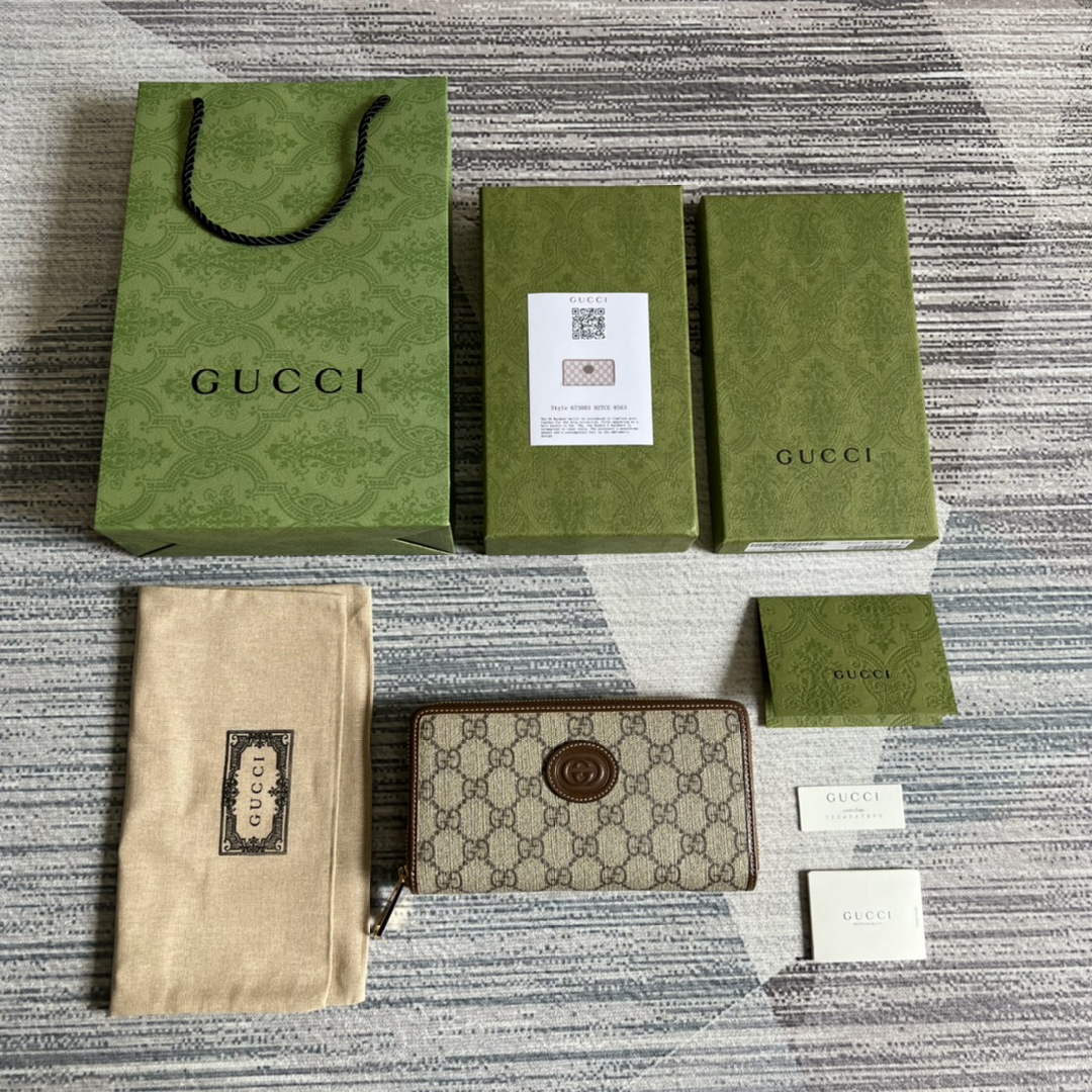 ‎Gucci 673003 Zip around wallet with Interlocking G brown