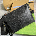 Gucci 696009 GG embossed medium messenger bag black