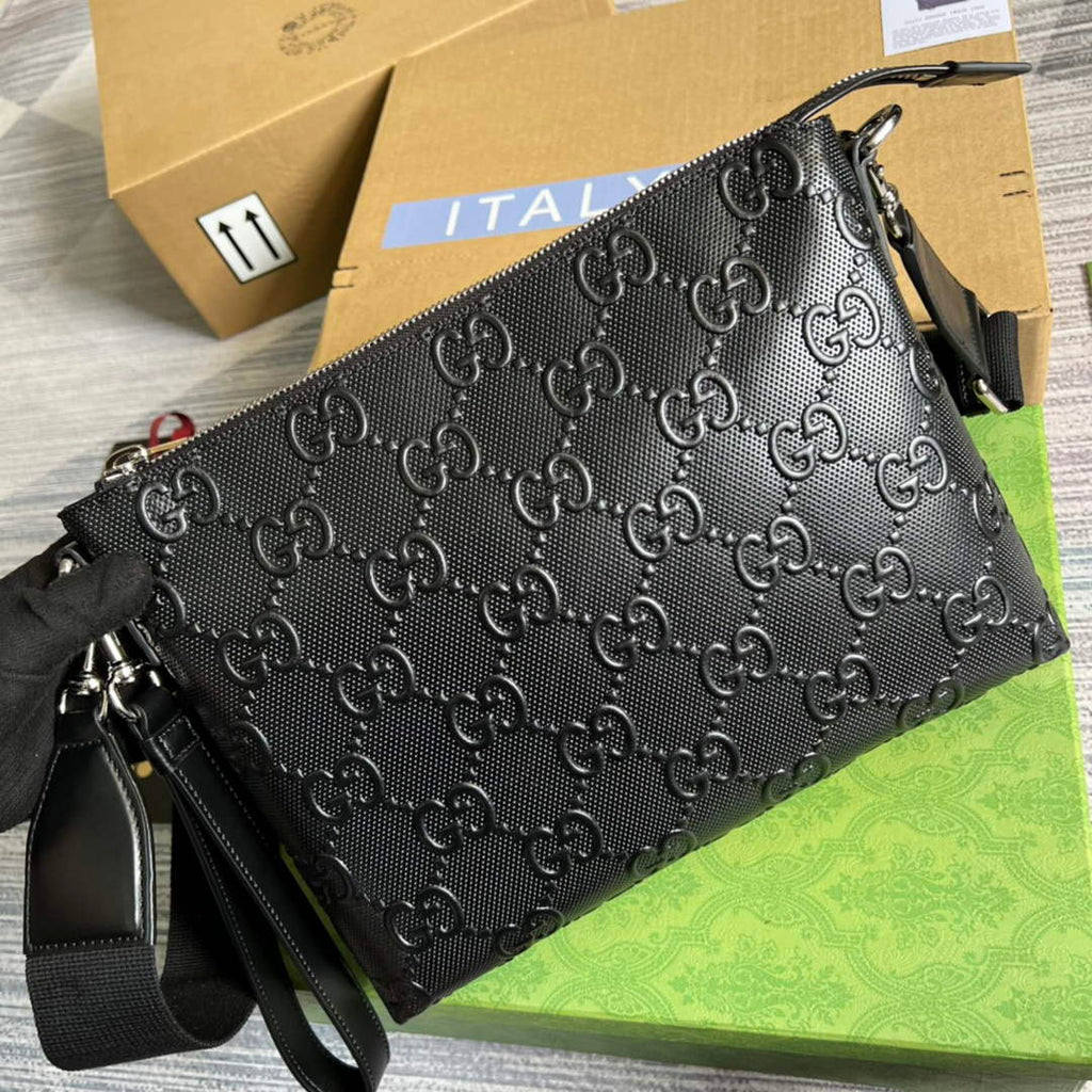 Gucci 696009 GG embossed medium messenger bag black