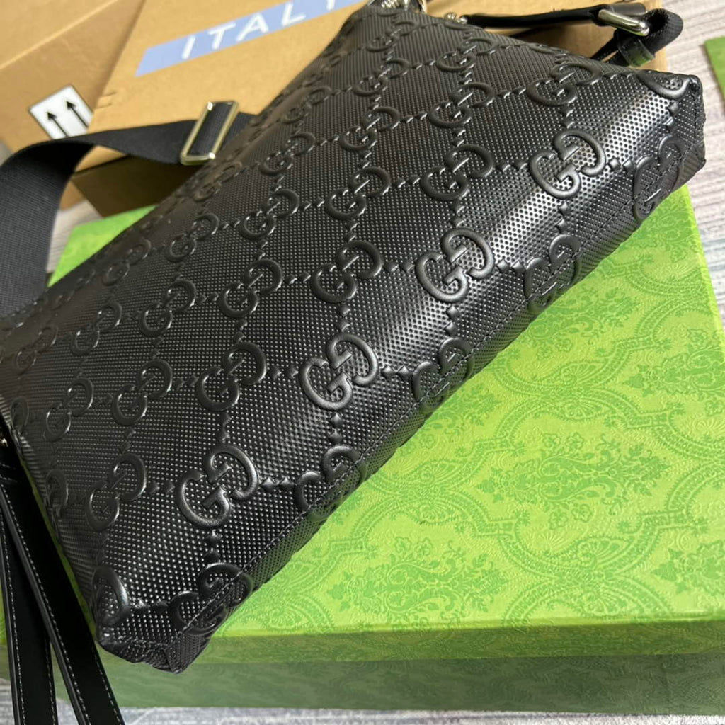 Gucci 696009 GG embossed medium messenger bag black