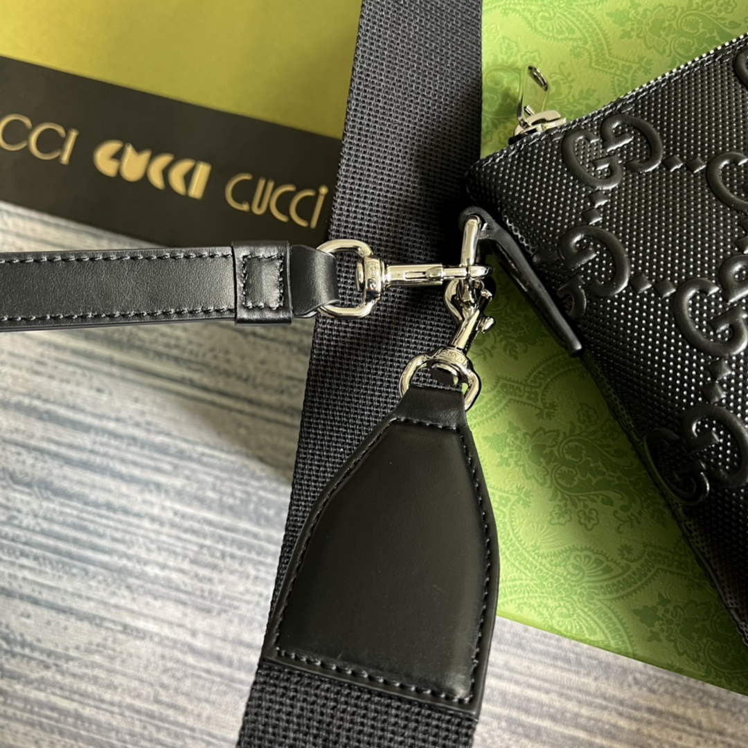 Gucci 696009 GG embossed medium messenger bag black